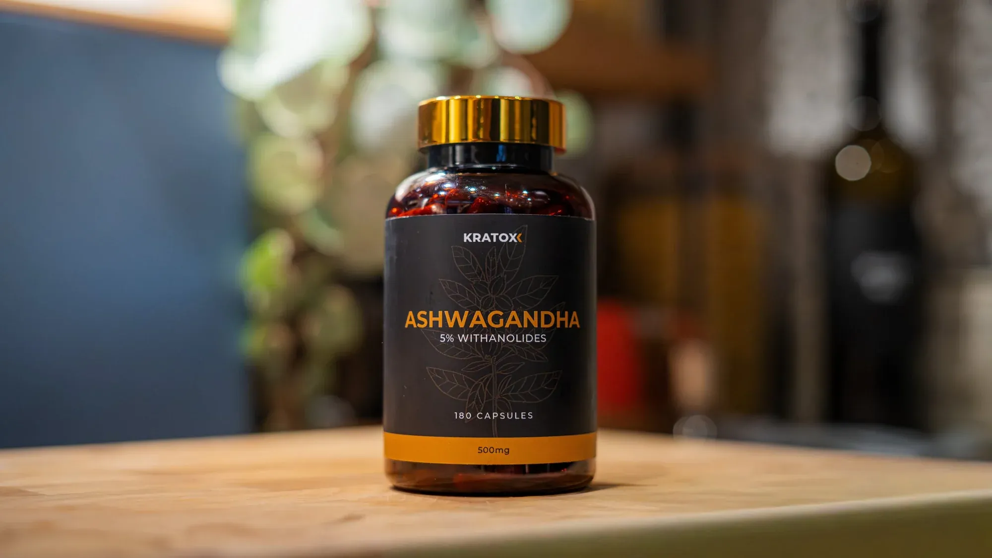 AOB supplement bottle photographed on a wooden table