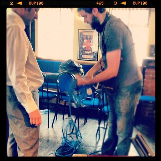 Setting up lighting for an alcohol campaign shoot