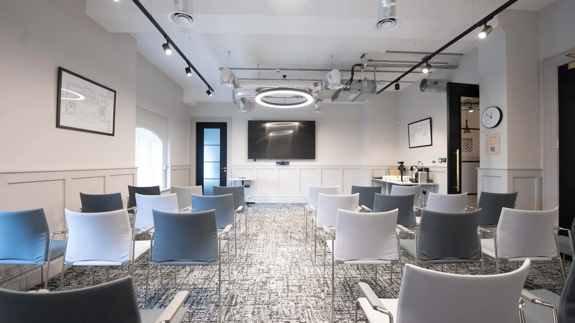 Wide view of a contemporary meeting space from the Kindred image library