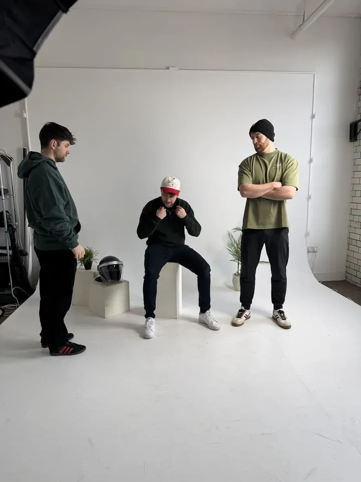 The team posing during a studio portrait session